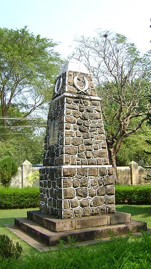 Stone monument placed in front of the church.